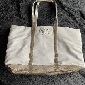 Victoria’s Secret gold and white bag